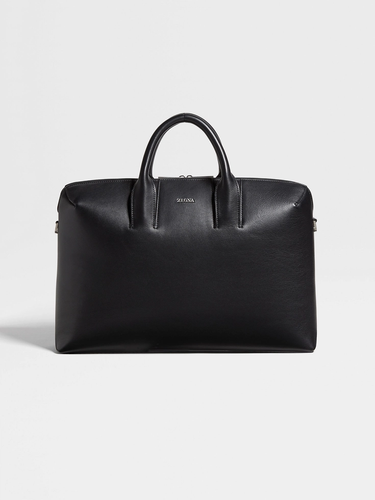 Bolso de mano de cuero negro
