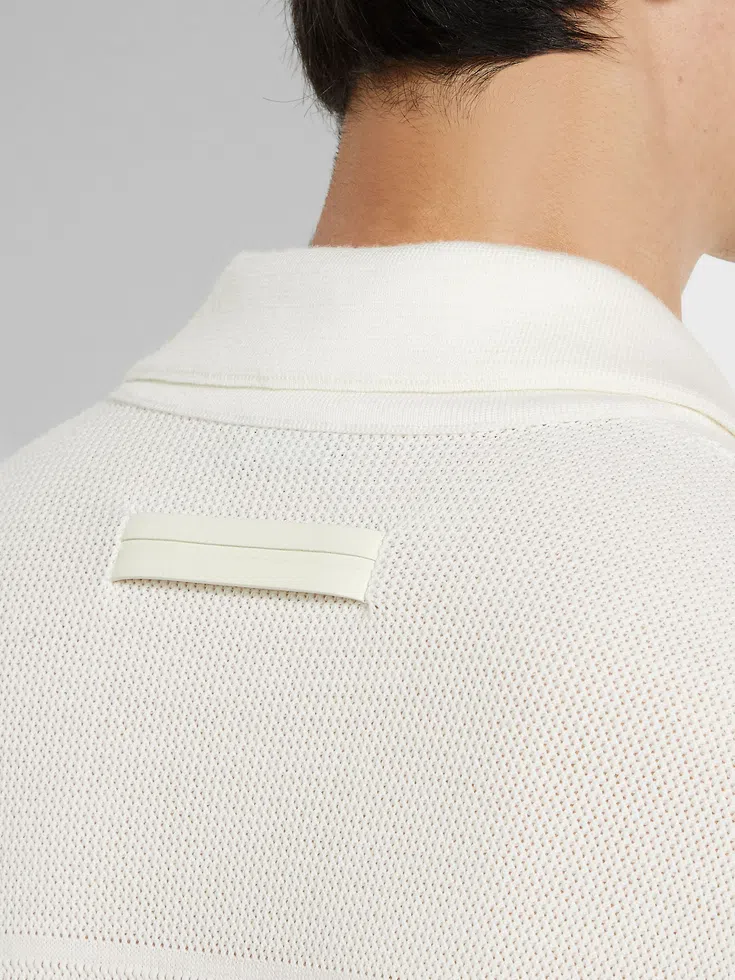 Camisa de lana blanca