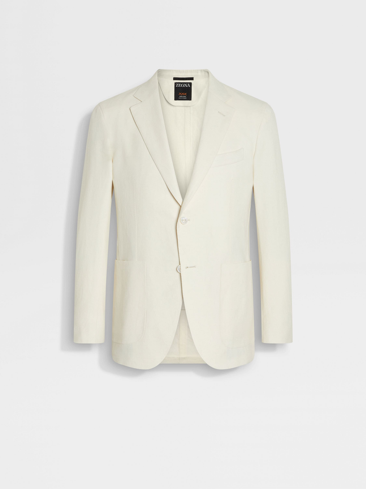 Chaqueta de lino azul con flores blancas de Oasi