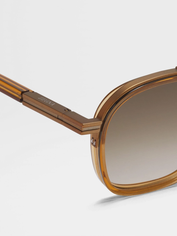 Gafas de sol de acetato y metal Orizzonte I de jarabe dorado transparente