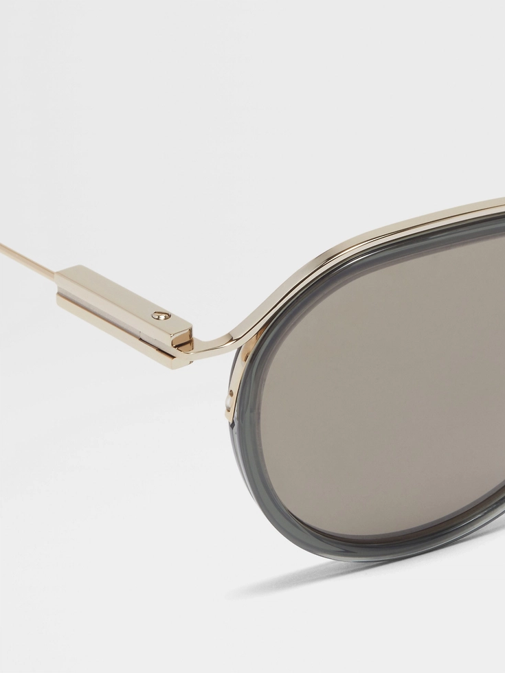 Gafas de sol de acetato y metal en verde transparente y dorado pálido