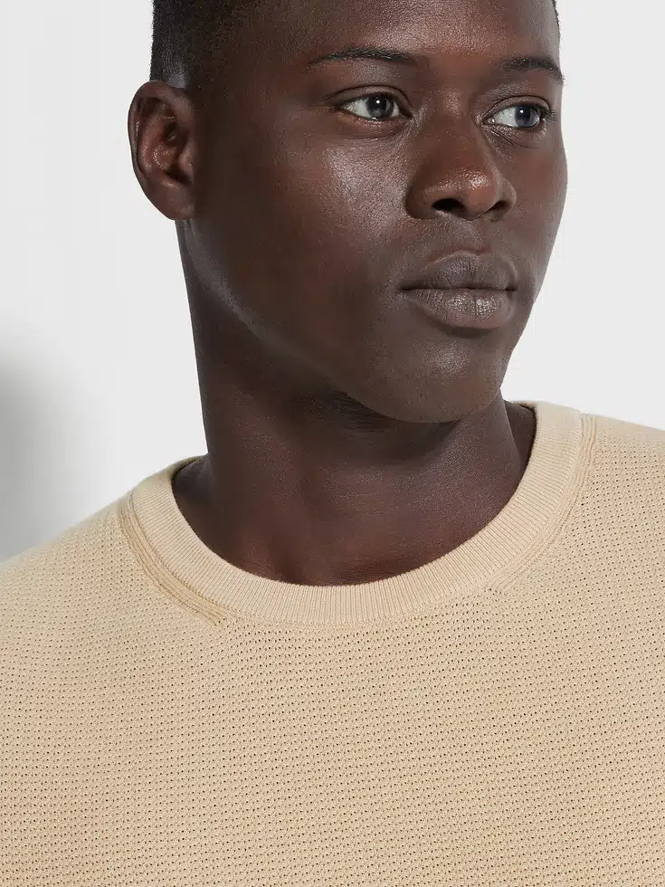 Jersey de cuello redondo de algodón premium beige claro