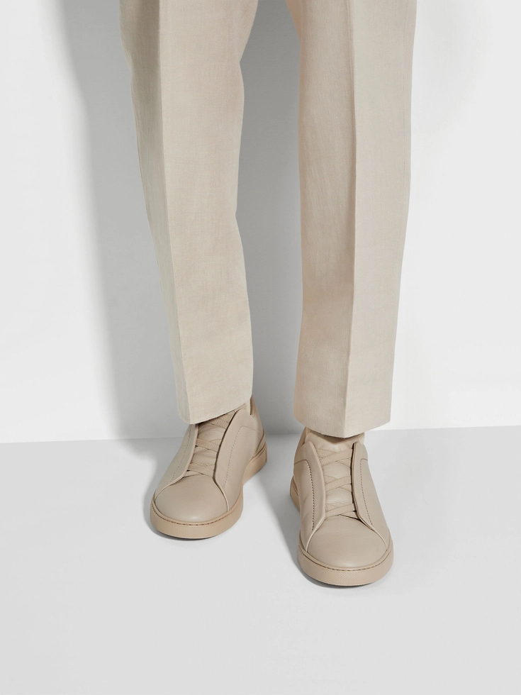 Zapatillas deportivas beige de piel de ciervo con triple costura™