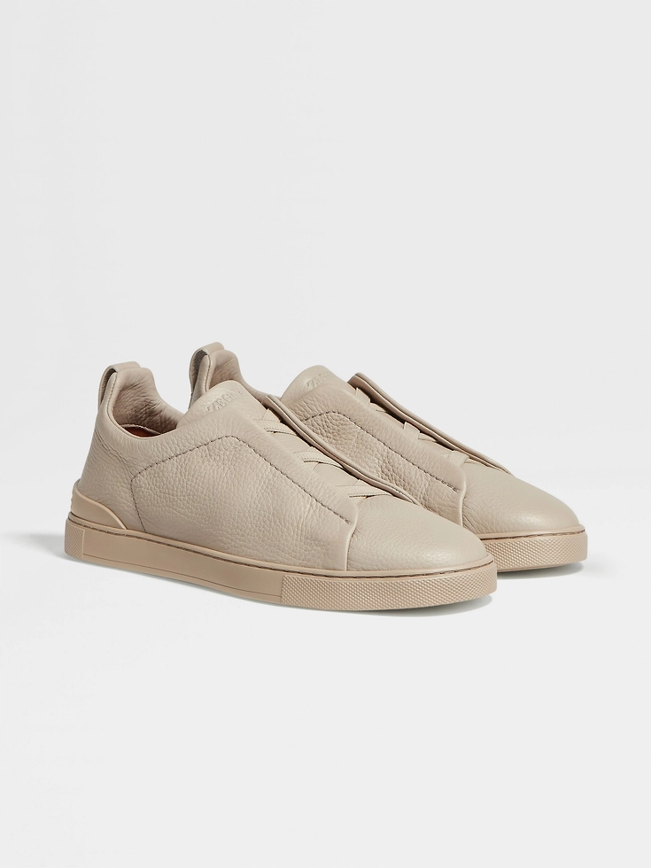 Zapatillas deportivas beige de piel de ciervo con triple costura™