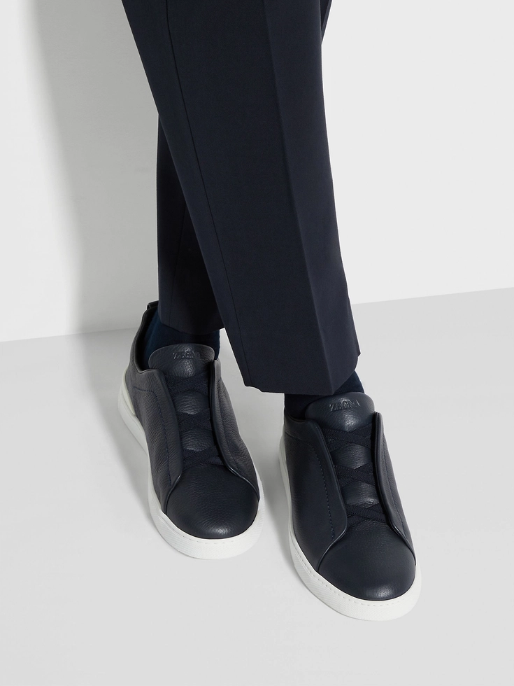 Zapatillas deportivas de piel de ciervo azul marino con triple puntada™
