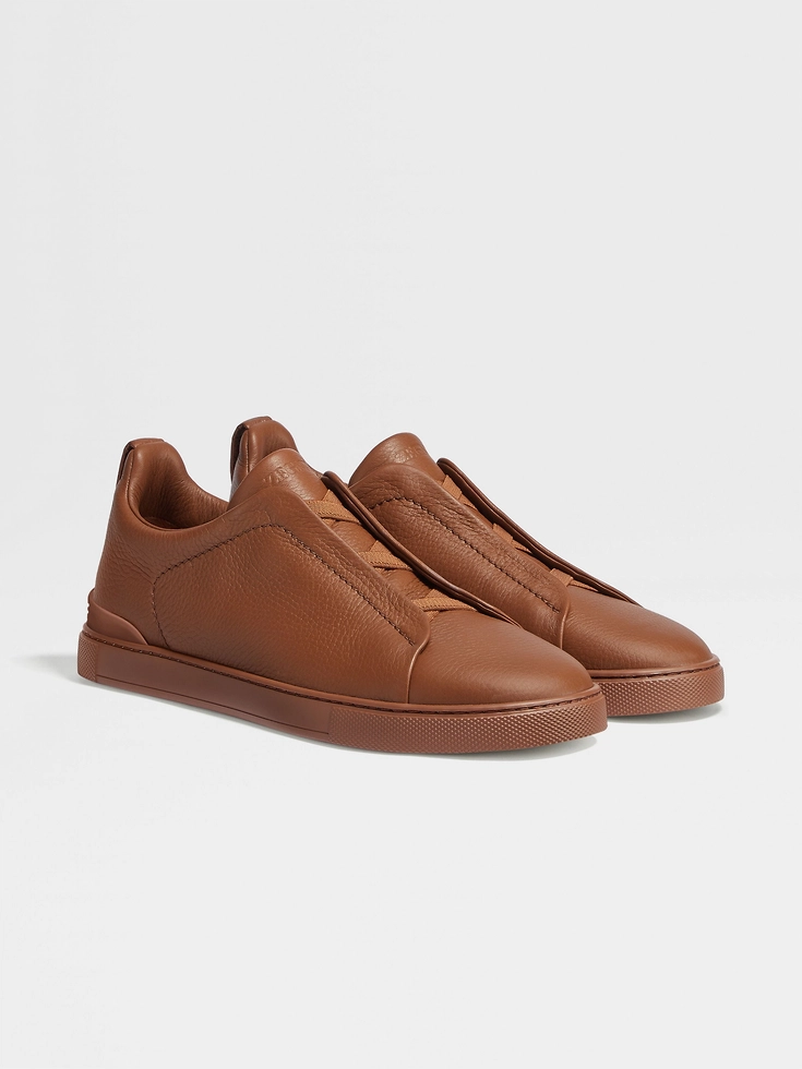 Zapatillas deportivas de piel de ciervo con triple costura™ y follaje oscuro