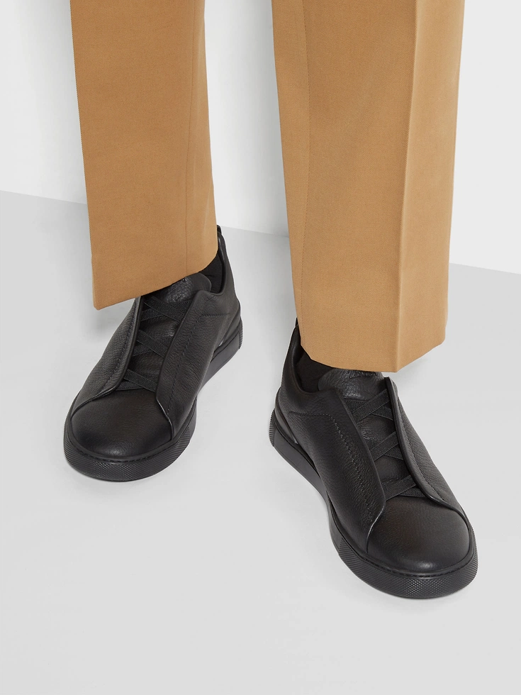 Zapatillas deportivas negras de piel de ciervo con triple puntada™