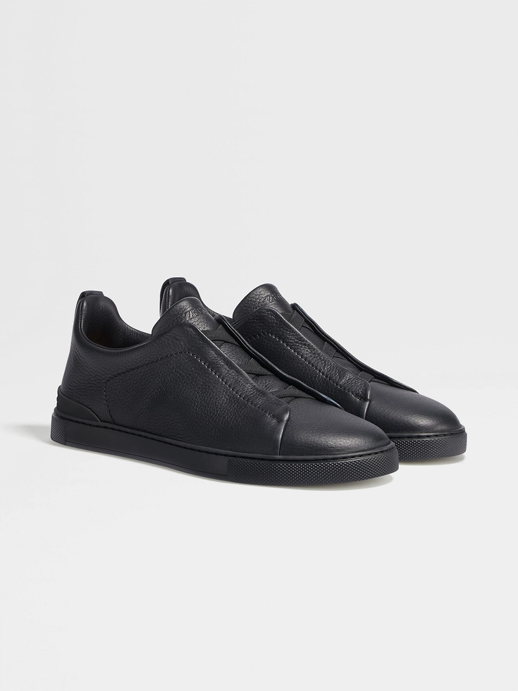 Zapatillas deportivas negras de piel de ciervo con triple puntada™