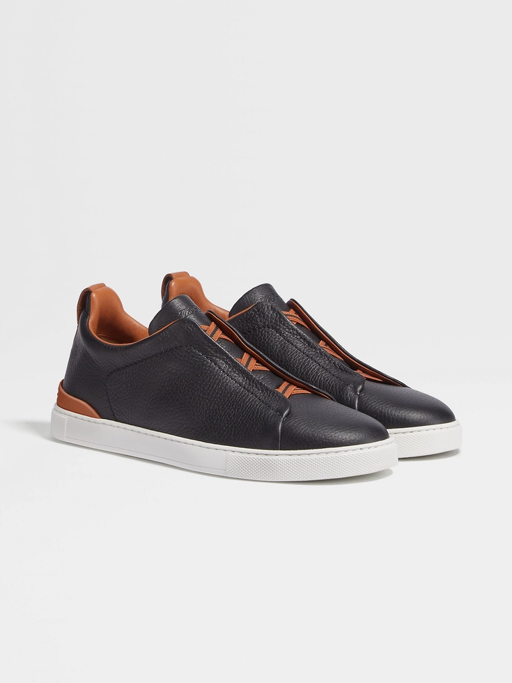 Zapatillas deportivas negras de piel de ciervo con triple puntada™
